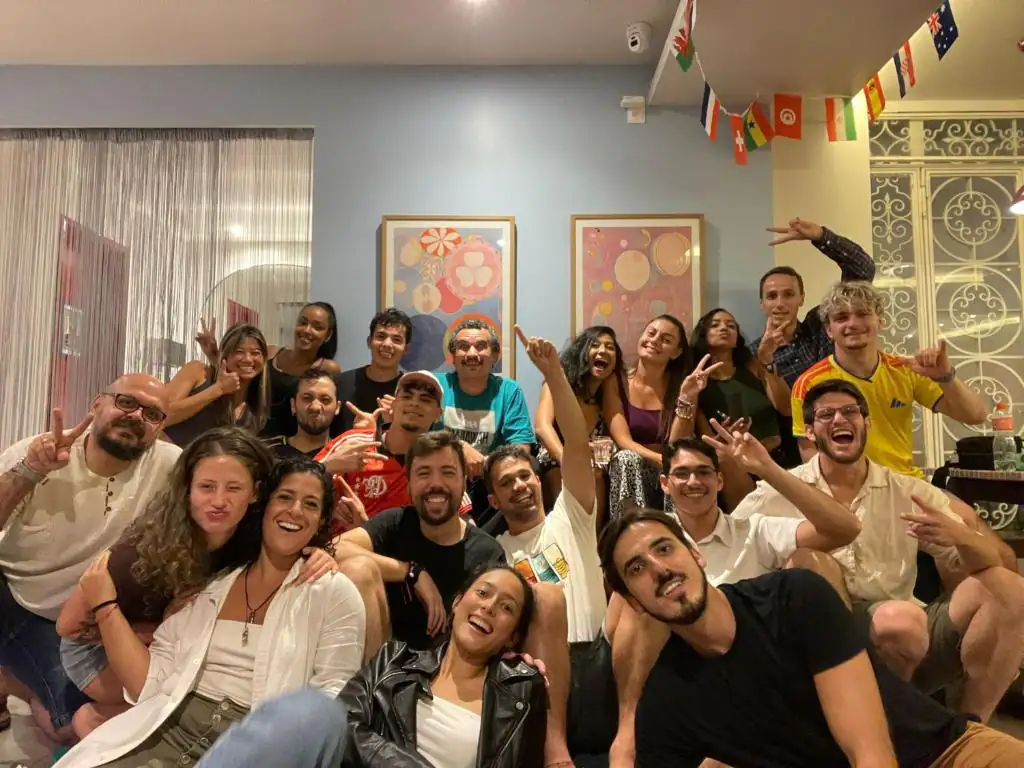 a group of people are posing for a picture at Opa! Hostel in Rio de Janeiro