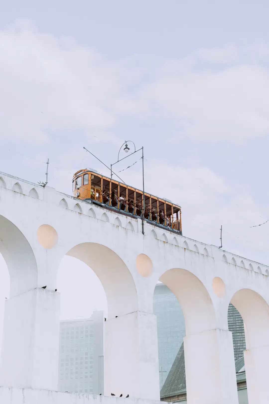 The Santa Teresa tram crossing the Carioca Aqueduct in Lapa