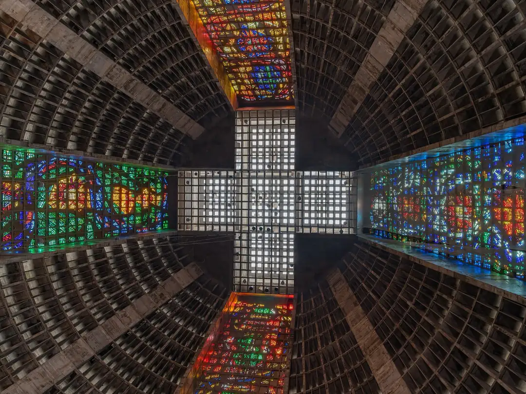Ceiling cross and stained glass inside Rio Metropolitan Cathedral