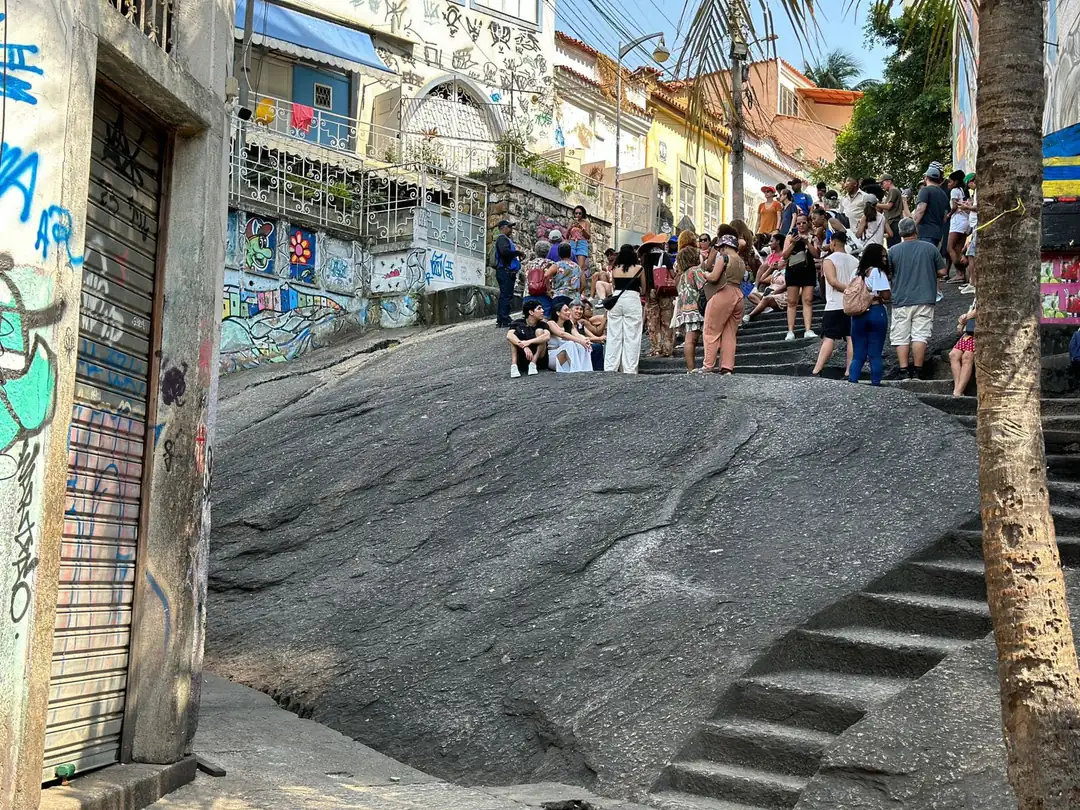 Visitors on the stone slope at Pedra do Sal in Rio