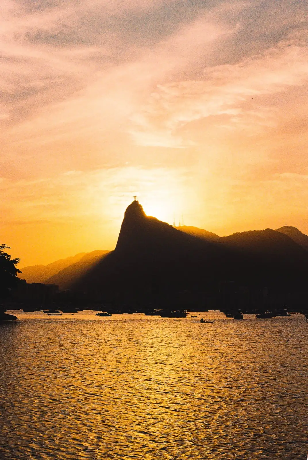 Golden sunset over the Rio skyline from Urca waterfront