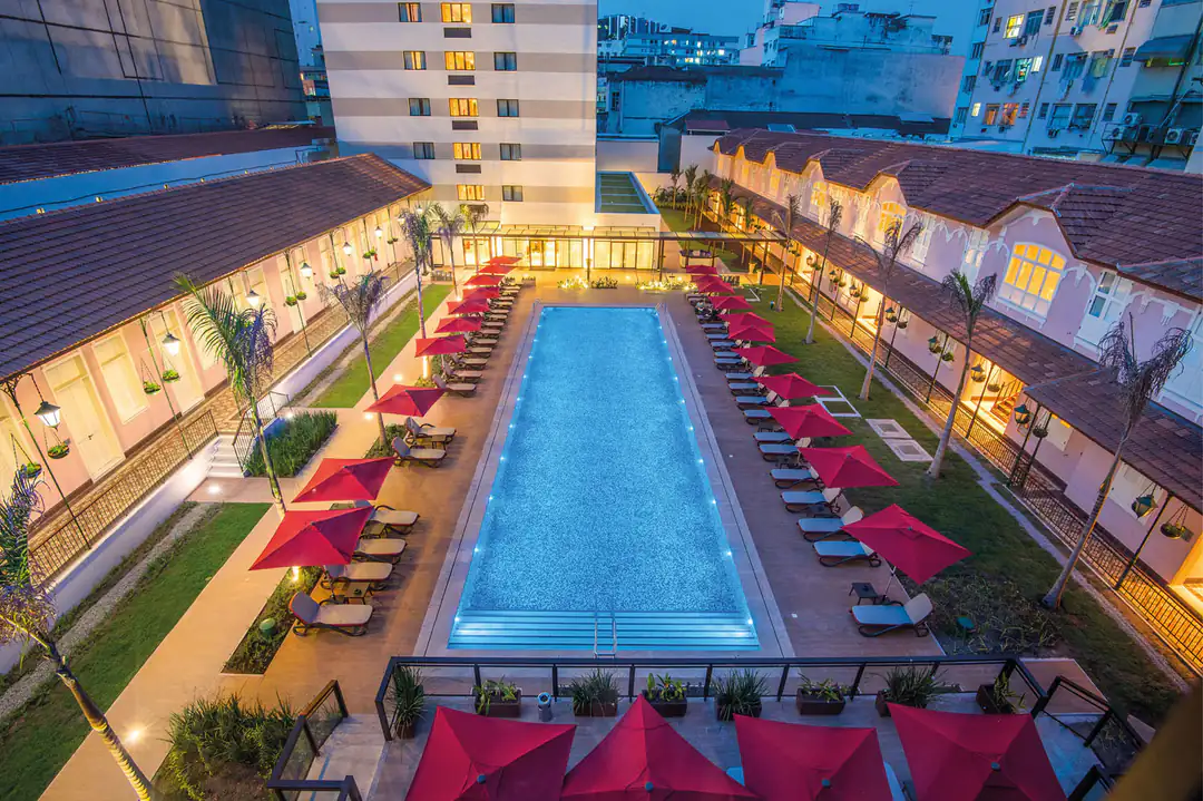 The outdoor pool at Vila Galé Rio de Janeiro in the evening