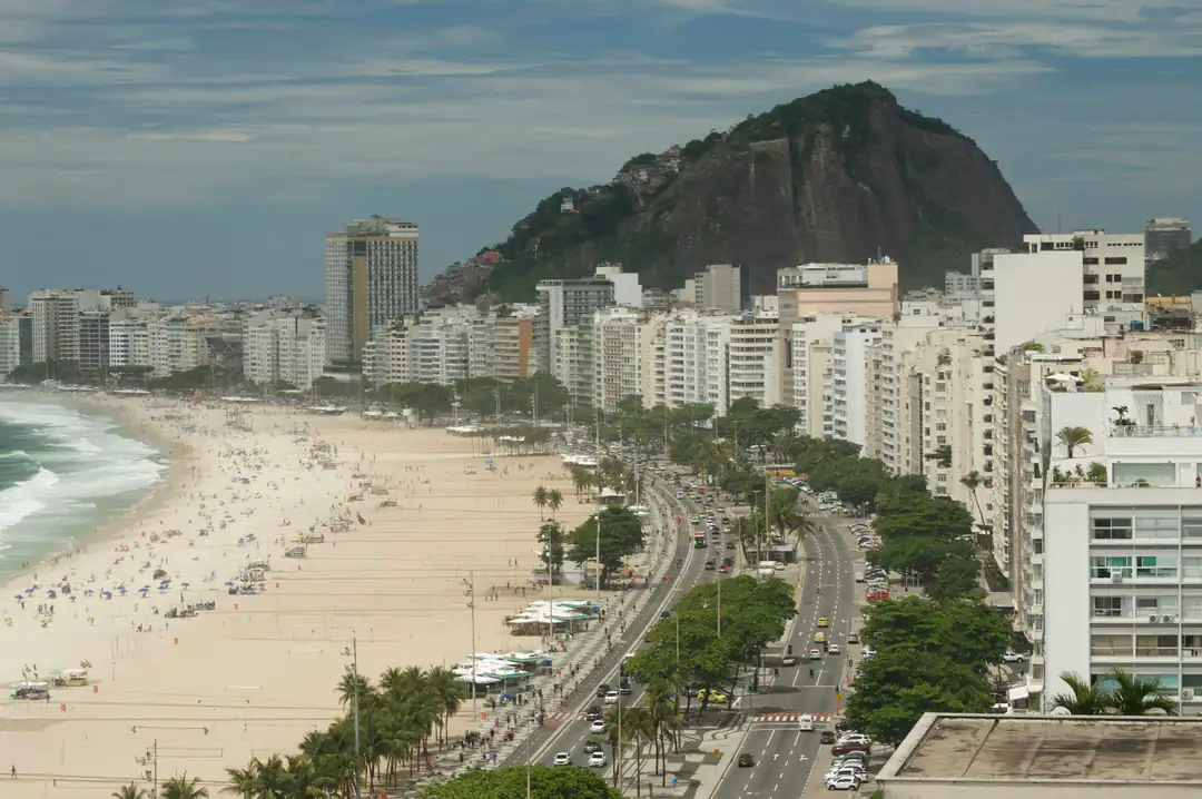 Copacabana beach, seafront buildings and the hill of Leme in Rio de Janeiro