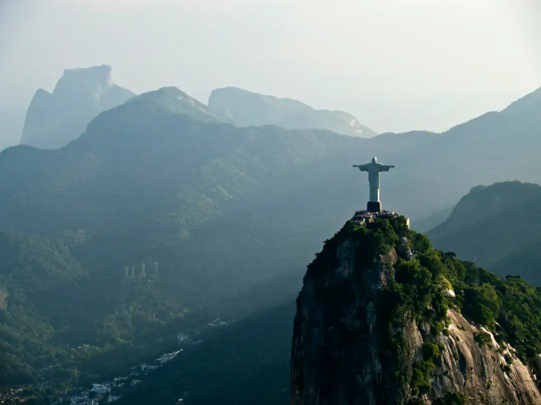 Christ the Redeemer on Corcovado surrounded by the mountains of Rio de Janeiro